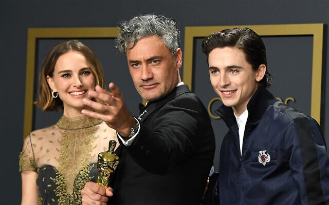 Jewish stars Natalie Portman, Taika Waititi, and Timothée Chalamet pose in the press room during the 92nd Annual Academy Awards (Photo by Steve Granitz/ WireImage/via JTA)