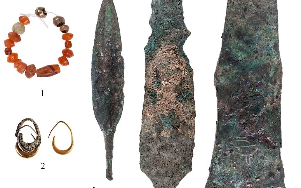Weapons and jewelry discovered at a 12th century BCE Canaanite temple at Lachish. (T. Rogovski)