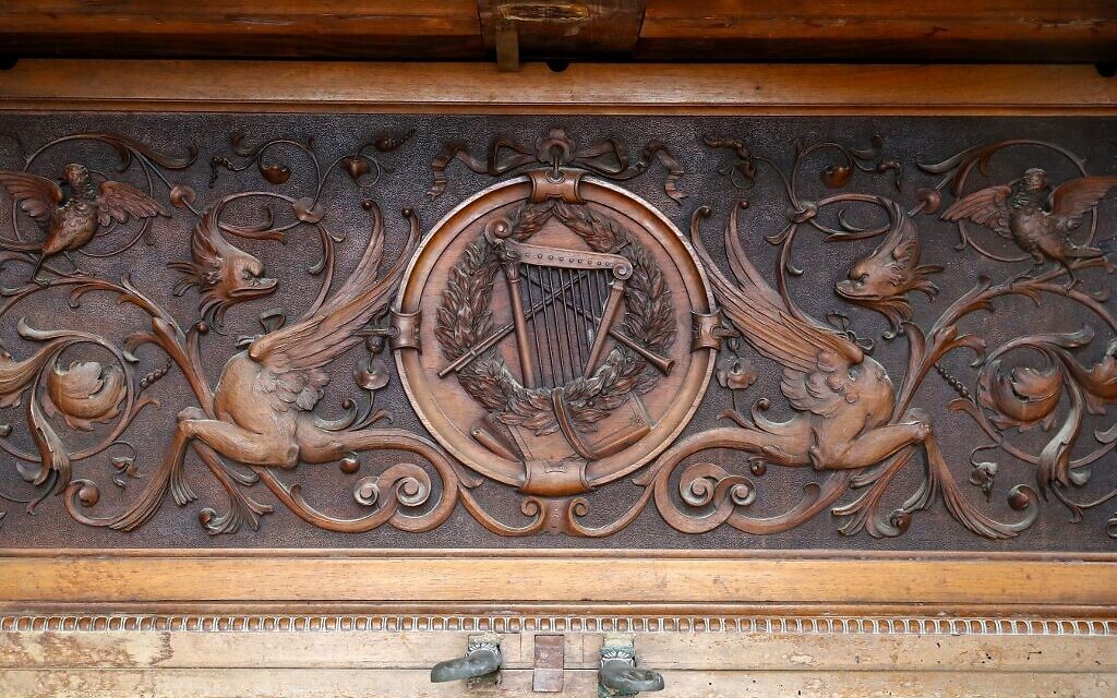 Carvings adorning the Piano of Siena, a 19th century instrument that disappeared for decades and was expected to fetch more than $1 million when put up for auction, seen in a home in the Israeli coastal city of Caesarea, February 18, 2020. (JACK GUEZ / AFP)