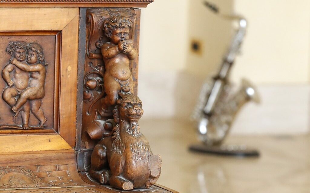Carvings adorning the Piano of Siena, a 19th century instrument that disappeared for decades and was expected to fetch more than $1 million when put up for auction, seen in a home in the Israeli coastal city of Caesarea, February 18, 2020. (JACK GUEZ / AFP)
