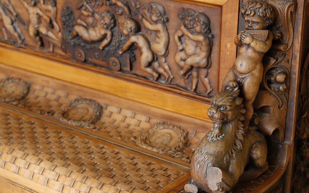 Carvings adorning the Piano of Siena, a 19th century instrument that disappeared for decades and was expected to fetch more than $1 million when put up for auction, seen in a home in the Israeli coastal city of Caesarea, February 18, 2020. (JACK GUEZ / AFP)