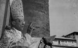 This undated photo provided by Italian news agency Ansa on February 23, 2020, shows Pope Pius XII blessing worshipers and attendees during the Urbi et Orbi apostolic blessing at St. Peter's Square in the Vatican (STRINGER / ANSA / AFP)