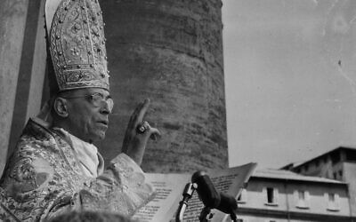 This undated photo provided by Italian news agency Ansa on February 23, 2020, shows Pope Pius XII blessing worshipers and attendees during the Urbi et Orbi apostolic blessing at St. Peter's Square in the Vatican (STRINGER / ANSA / AFP)