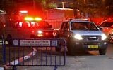 Illustrative: An ambulance, carrying an Israeli woman returning from Italy who displayed symptoms of the coronavirus, arrives at the infectious disease unit at the Sheba Medical Center in Tel Hashomer on February 28, 2020. (Jack Guez/AFP)