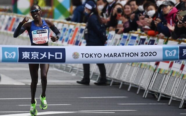 Lona Chemtai Salpeter of Israel crosses the finish line to win the women's category of the Tokyo Marathon in Tokyo on March 1, 2020. (CHARLY TRIBALLEAU / AFP) Lona Chemtai Salpeter of Israel crosses the finish line to win the women's category of the Tokyo Marathon in Tokyo on March 1, 2020. (CHARLY TRIBALLEAU / AFP)