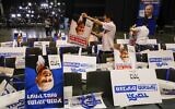 Volunteers sort election posters bearing the portrait of Prime Minister Benjamin Netanyahu, at the Likud party's electoral campaign headquarters in Tel Aviv on March 2, 2020. (Jack Guez/AFP)