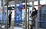 An Iranian woman wears a protective mask in the capital Tehran on March 4, 2020 (ATTA KENARE / AFP)