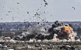 In this file photo taken on March 3, 2019, smoke and fire billow after shelling on the Islamic State group's last holdout of Baghouz, in the eastern Syrian Deir Ezzor province. (Photo by Delil souleiman / AFP)