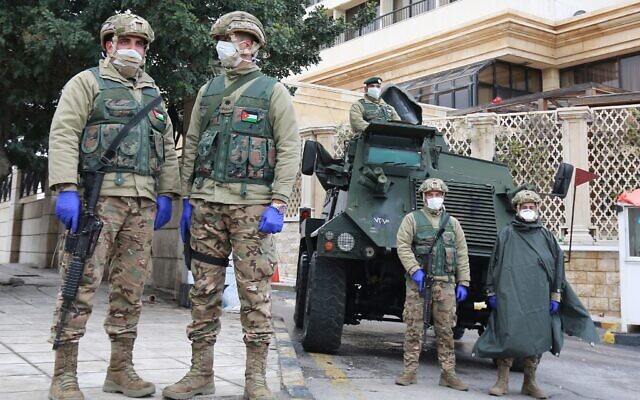 Illustrative: Jordanian soldiers in the capital Amman on March 18, 2020, as Jordan takes measures to fight the spread of the coronavirus. (Khalil Mazraawi/AFP) Illustrative: Jordanian soldiers in the capital Amman on March 18, 2020, as Jordan takes measures to fight the spread of the coronavirus. (Khalil Mazraawi/AFP)