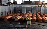 A view shows some of 35 coffins of deceased people stored in a warehouse in Ponte San Pietro, near Bergamo, Lombardy, on March 26, 2020 prior to be transported in another region to be cremated. (Piero CRUCIATTI / AFP)