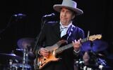 In this file photo taken on July 22, 2012, Bob Dylan performs during the 21st edition of the Vieilles Charrues music festival in Carhaix-Plouguer, western France (Fred TANNEAU / AFP)