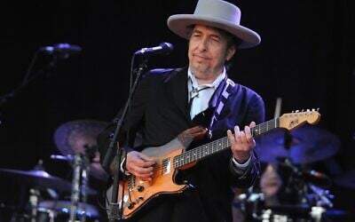 In this file photo taken on July 22, 2012, Bob Dylan performs during the 21st edition of the Vieilles Charrues music festival in Carhaix-Plouguer, western France (Fred TANNEAU / AFP)