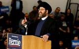 Imam Al-Hasan Qazwini from the Islamic Institute of America, speaks during a campaign rally for Democratic presidential hopeful Bernie Sanders at Salina Intermediate School in Dearborn, Michigan, on March 7, 2020. (JEFF KOWALSKY/AFP via Getty Images via JTA)