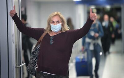 Travelers arrive in the international terminal at O'Hare Airport on March 15, 2020 in Chicago, Illinois. (Scott Olson/Getty Images/AFP)