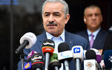 Palestinian Authority Prime Minister Mohammed Shtayyeh announcing a series of measures, which he said aim to prevent the spread of the novel coronavirus in Ramallah on March 22, 2020. (Credit: Wafa)
