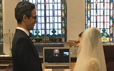 Jalna Silverstein and Asael Papour are married in New York, March 22, 2020. (Courtesy of Silverstein/via JTA)