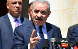 Palestinian Authority Prime Minister Mohammed Shtayyeh addressing a press conference in Ramallah on March 29, 2020. (Wafa)