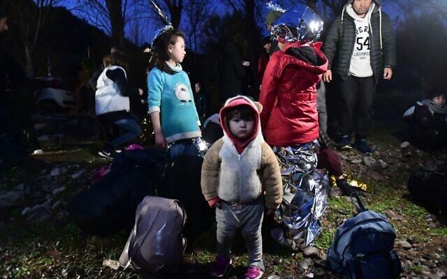 Migrants arrive at the village of Skala Sikaminias, on the Greek island of Lesbos, after crossing on a dinghy the Aegean sea from Turkey on March 1, 2020. (AP/Michael Varaklas) Migrants arrive at the village of Skala Sikaminias, on the Greek island of Lesbos, after crossing on a dinghy the Aegean sea from Turkey on March 1, 2020. (AP/Michael Varaklas)