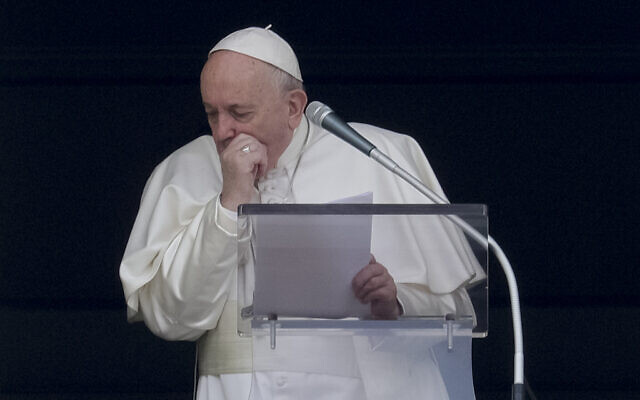Pope Francis coughs during the Angelus noon prayer he recited from the window of his studio overlooking St. Peter's Square, at the Vatican, March 1, 2020. (AP Photo/Andrew Medichini) Pope Francis coughs during the Angelus noon prayer he recited from the window of his studio overlooking St. Peter's Square, at the Vatican, March 1, 2020. (AP Photo/Andrew Medichini)