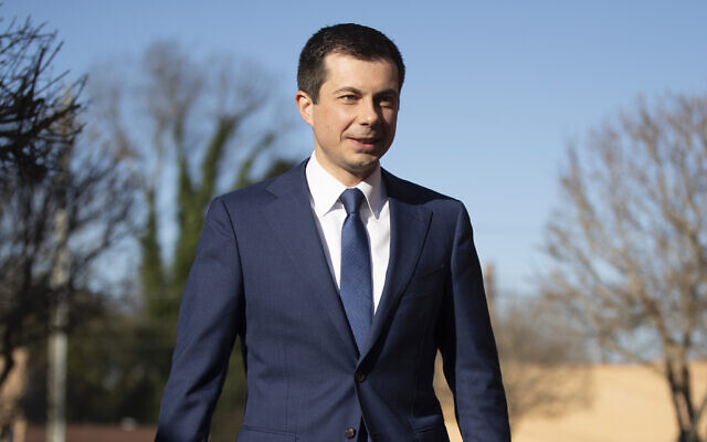 Then-Democratic US presidential candidate and former South Bend, Indiana mayor Pete Buttigieg walks to speak with members of the media, March 1, 2020, in Plains, Georgia. (AP Photo/Matt Rourke) Then-Democratic US presidential candidate and former South Bend, Indiana mayor Pete Buttigieg walks to speak with members of the media, March 1, 2020, in Plains, Georgia. (AP Photo/Matt Rourke)