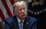 US President Donald Trump speaks during a meeting with banking industry executives at the White House, in Washington, March 11, 2020. (Evan Vucci/AP)