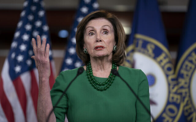 Speaker of the House Nancy Pelosi, Democrat-California, updates reporters as lawmakers continue work on a coronavirus aid package, on Capitol Hill in Washington, March 12, 2020. (AP Photo/J. Scott Applewhite) Speaker of the House Nancy Pelosi, Democrat-California, updates reporters as lawmakers continue work on a coronavirus aid package, on Capitol Hill in Washington, March 12, 2020. (AP Photo/J. Scott Applewhite)