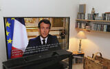 French President Emmanuel Macron speaks during a television address, in Ciboure, southwestern France, March 16, 2020. (Bob Edme/AP)