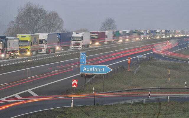 Trucks are jammed in the early morning on Autobahn 12 in front of the German-Polish border crossing near Frankfurt (Oder), Germany, March 18, 2020. (Patrick Pleul/dpa via AP) Trucks are jammed in the early morning on Autobahn 12 in front of the German-Polish border crossing near Frankfurt (Oder), Germany, March 18, 2020. (Patrick Pleul/dpa via AP)