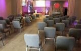 This March 19, 2020 photo provided by Bob Arrington of Arrington Funeral Directors shows a viewing room with seating arranged to facilitate social distancing amid the coronavirus outbreak, at their funeral home in Jackson, Tennessee. (Cliff Walker Jr./Arrington Funeral Directors via AP)