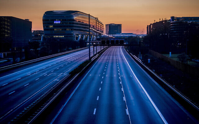 The highway along the airport is empty in Frankfurt, Germany, Sunday, March 22, 2020. (AP Photo/Michael Probst) The highway along the airport is empty in Frankfurt, Germany, Sunday, March 22, 2020. (AP Photo/Michael Probst)