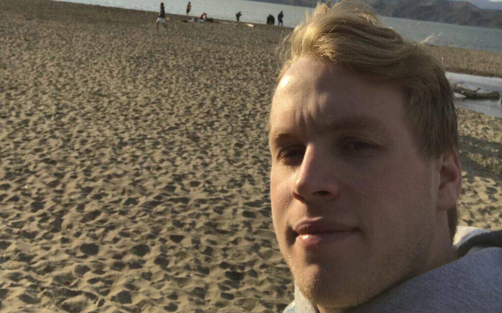 Lance Sell takes a selfie on a San Francisco beach while walking, March 20, 2020. Sell, 19, is a freshman at Lehigh University and says a lot of people his age are "spooked" by the coronavirus crisis. (Lance Sell via AP) Lance Sell takes a selfie on a San Francisco beach while walking, March 20, 2020. Sell, 19, is a freshman at Lehigh University and says a lot of people his age are "spooked" by the coronavirus crisis. (Lance Sell via AP)