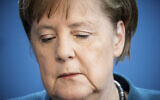 German Chancellor Angela Merkel speaks at a press conference about coronavirus, in Berlin, March 22, 2020. (Michael Kappeler/ Pool photo via AP)