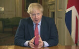 In this screen grab taken from video, Britain's Prime Minister Boris Johnson addresses the nation from 10 Downing Street, in London, Monday March 23, 2020. (UK Pool via AP)