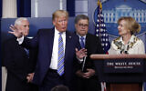 President Donald Trump gestures as he asks a question to Dr. Deborah Birx, White House coronavirus response coordinator, during a briefing about the coronavirus in the James Brady Briefing Room, Monday, March 23, 2020, in Washington. (AP Photo/Alex Brandon)