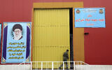 A member of the Iranian Army works at a temporary hospital in Tehran, Iran, March 26, 2020. (AP Photo/Ebrahim Noroozi)