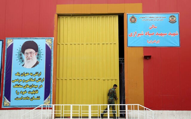 A member of the Iranian Army works at a temporary hospital in Tehran, Iran, March 26, 2020. (AP Photo/Ebrahim Noroozi) A member of the Iranian Army works at a temporary hospital in Tehran, Iran, March 26, 2020. (AP Photo/Ebrahim Noroozi)