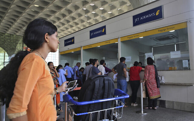 Passengers stand at the Jet Airways counter at Chhatrapati Shivaji Maharaj International Airport in Mumbai, India on April 18, 2019. (AP/Rafiq Maqbool) Passengers stand at the Jet Airways counter at Chhatrapati Shivaji Maharaj International Airport in Mumbai, India on April 18, 2019. (AP/Rafiq Maqbool)