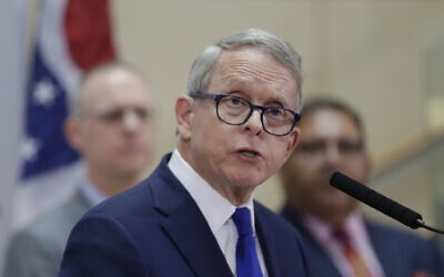 Ohio Governor Mike DeWine gives an update at MetroHealth Medical Center on the state's preparedness and education efforts to limit the potential spread of coronavirus, Feb. 27, 2020, in Cleveland. (AP Photo/Tony Dejak)