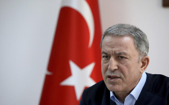Turkey's Defence Minister Hulusi Akar speaks to journalists in Hatay, Turkey, February 28, 2020. (AP Photo)
