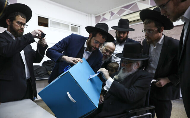 Ultra-orthodox man votes during elections in Bnei Brak, Israel, March 2, 2020. (AP Photo/Oded Balilty) Ultra-orthodox man votes during elections in Bnei Brak, Israel, March 2, 2020. (AP Photo/Oded Balilty)