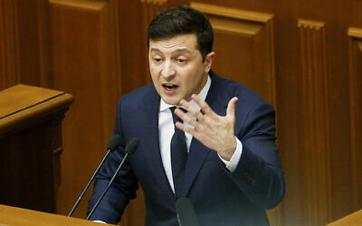 Ukrainian President Volodymyr Zelensky addresses the Ukrainian parliament in Kyiv, Ukraine, March, 4, 2020. (AP Photo/Efrem Lukatsky)