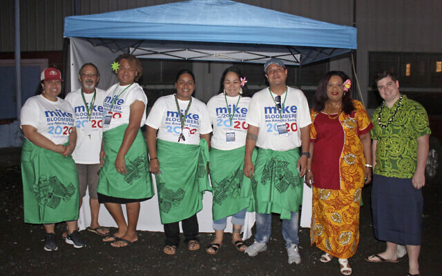 Supporters along with two US based officials for the Mike Bloomberg campaign gather on March 3, 2020, in Tafuna village near Pago Pago, American Samoa (AP Photo/Fili Sagapolutele) Supporters along with two US based officials for the Mike Bloomberg campaign gather on March 3, 2020, in Tafuna village near Pago Pago, American Samoa (AP Photo/Fili Sagapolutele)