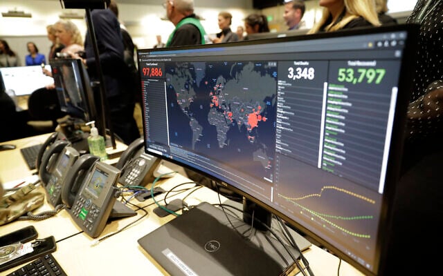 A monitor displays world-wide statistics relating to the spread of the COVID-19 coronavirus during a visit of Vice President Mike Pence to the Washington State Emergency Operations Center, Thursday, March 5, 2020 at Camp Murray in Washington state. (AP/Ted S. Warren) A monitor displays world-wide statistics relating to the spread of the COVID-19 coronavirus during a visit of Vice President Mike Pence to the Washington State Emergency Operations Center, Thursday, March 5, 2020 at Camp Murray in Washington state. (AP/Ted S. Warren)