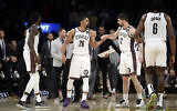 Brooklyn Nets players during the second half of an NBA basketball game against the Los Angeles Lakers Tuesday, March 10, 2020, in Los Angeles. (AP/Marcio Jose Sanchez)