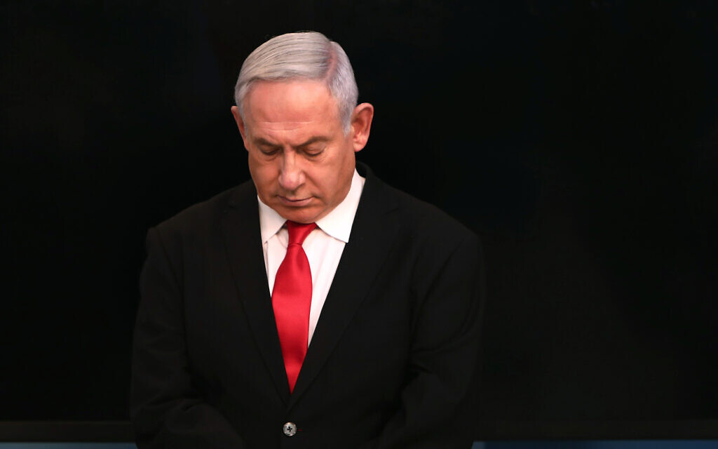 Prime Minister Benjamin Netanyahu arrives for a speech from his Jerusalem office on Saturday, March 14, 2020, saying Israel's restaurants and places of entertainment will be closed to stop the spread of the coronavirus. (Gali Tibbon/Pool via AP) Prime Minister Benjamin Netanyahu arrives for a speech from his Jerusalem office on Saturday, March 14, 2020, saying Israel's restaurants and places of entertainment will be closed to stop the spread of the coronavirus. (Gali Tibbon/Pool via AP)