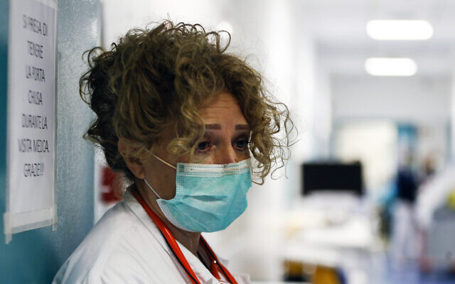 A medical staffer at the Santo Spirito hospital in Rome, March 30, 2020. (Cecilia Fabiano/LaPresse via AP) A medical staffer at the Santo Spirito hospital in Rome, March 30, 2020. (Cecilia Fabiano/LaPresse via AP)