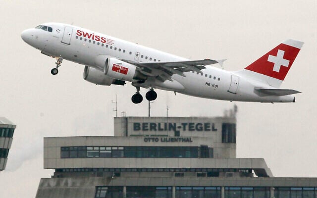 File: A 'Swiss' plane of lifts off at Tegel airport in Berlin, Germany, 2013. (AP Photo/Michael Sohn)
