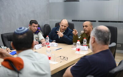 Defense Minister Naftali Bennett visits an IDF Home Front Command exercise simulating the spread of the coronavirus on March 8, 2020. (Defense Ministry)