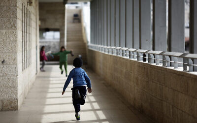 Illustrative: Arab and Israeli children are seen at the Max Rayne Hand in Hand school for bilingual education in Jerusalem, February 14, 2012. (Kobi Gideon/Flash90/File)