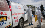 Medical staff seen after the arrival of a patient to the Shaare Zedek Medical Center in Jerusalem, over suspicions she may be infected with the Coronavirus on January 27, 2020. (Yonatan Sindel/Flash90)
